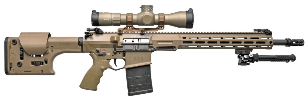 A tactical rifle with a flat dark earth finish, featuring a precision scope mounted on top, a collapsible stock, and a handguard with ventilated rail system.